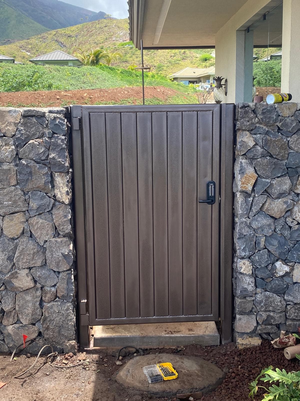 Steel Pedestrian Gate in Lava Rock Wall — Maui
