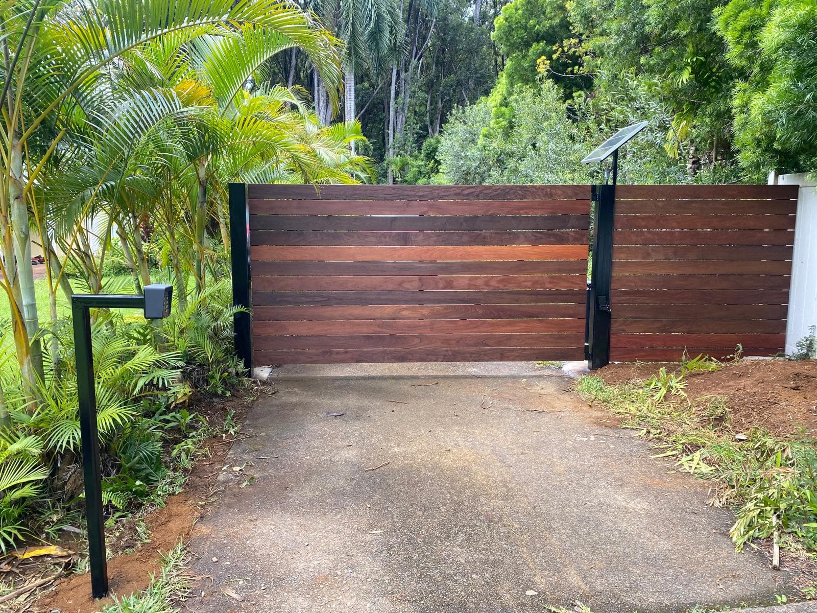 Horizontal Slat Hardwood Gate with Solar Opener — Maui